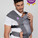 Man carries baby on his front in Izmi Breeze Baby Carrier