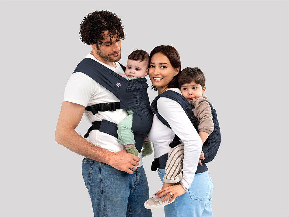 Izmi Baby Trage – Ergonomische Tragehilfe Ab Geburt (3,2-15 Kg), 3 Tragepositionen, Hüftgesund, Schwarz